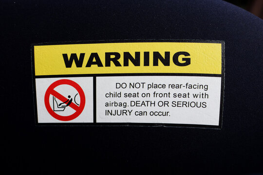 Warning note on carry cot for babies 