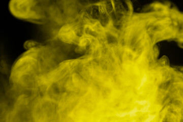 Yellow steam on a black background.