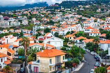 Buildings crowded together on the hills of Funchal in Madeira