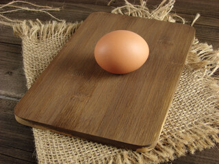 Fresh chicken egg in a rustic style