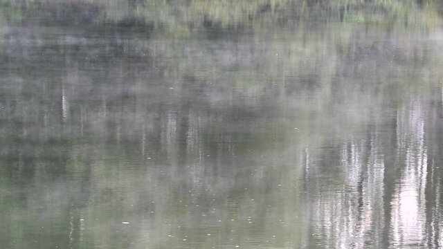 LD Hazy lake in rain