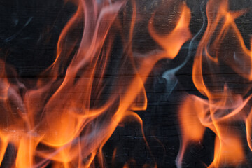 wood background is burning with fire