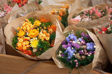 bouquets of orange and purple flowers