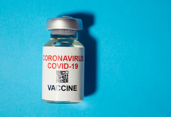 Covid-19 coronavirus vaccine on the blue background