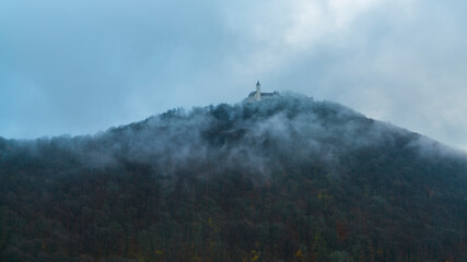 Germany, Magical view of swabian jura nature landscape at sunrise near stuttgart with view to castle teck in autumn in foggy mood