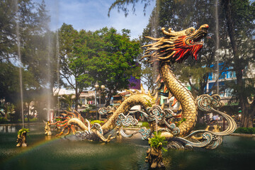 Naklejka premium Dragon sculpture in Chinatown of Ho Chi Minh, Vietnam