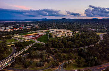 Aerial view of the Australian Parliament House at evening twilight in Canberra, the Australian...
