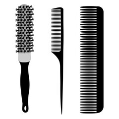 Hairdressing combs. A barber's tool. Combs for hair styling. Set of combs and brushes for hairdressing.