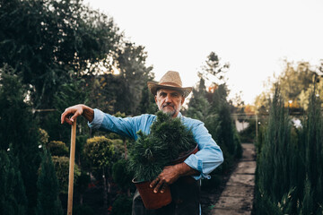 gardener posing outdoor in garden