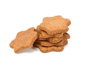 Star shaped baked chocolate gingerbread cookie isolated on white background