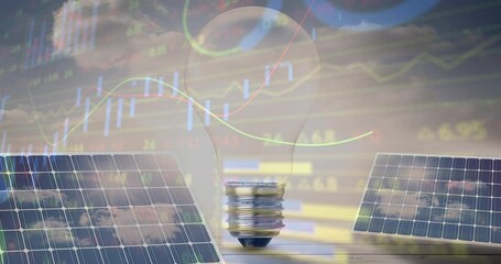 Animation of financial data processing over light bulb and solar panels - Powered by Adobe