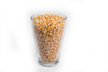 Glass of corn on a white background