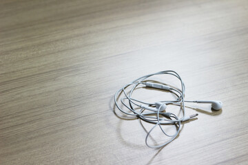 Headphones on wood background, Copy space.