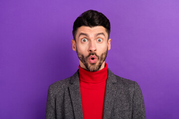 Photo of impressed nice brown hair man wear red sweater jacket isolated on vivid purple color background