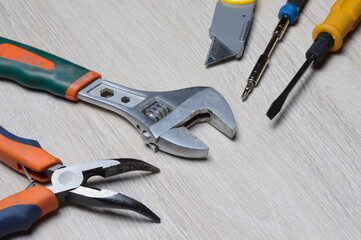 tools for minor home repairs are on the countertop. view from above.