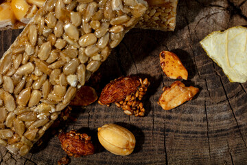 Kozinaki of sesame on the wooden background