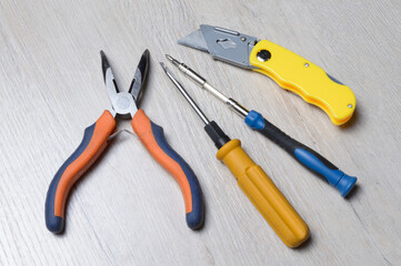 tools for minor home repairs are on the countertop. view from above.