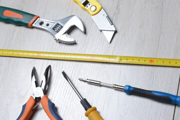 tools for minor home repairs are on the countertop. view from above.