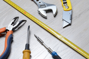 tools for minor home repairs are on the countertop. view from above.