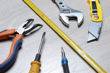 tools for minor home repairs are on the countertop. view from above.