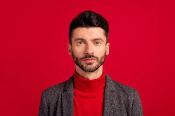 Photo of serious nice grey brown hair man wear red sweater jacket isolated on vivid color background