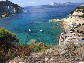 Motorboats moored in the crystal clear Tyrrhenian sea