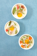 baked egg with cream and asparagus