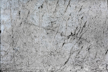 Old broken sanded aged natural facade of creased scuffed marble. Rough edges wrinkled rock of uneven wall. Cracked chipped messy falling dust. Dirty textured flaking shabby vintage floor for 3D design
