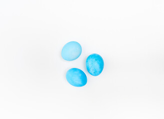 Easter eggs on white background. Easter concept. Top view.