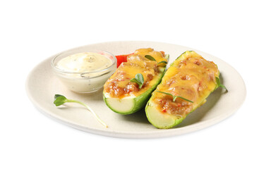 Baked stuffed zucchinis with sauce on white background