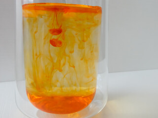 water in a glass colored with manganese, beautiful patterns