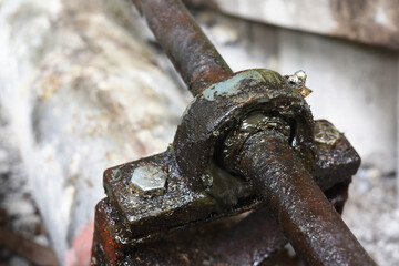 Ball bearing of water pump with dirty grease .