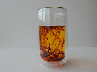 water in a glass colored with manganese, beautiful patterns