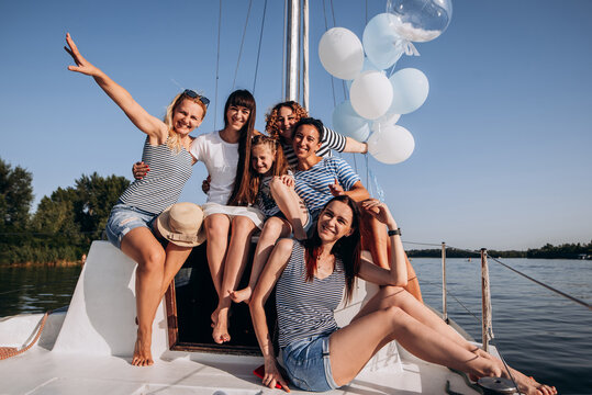 Bachelorette Party And Vacation Concept .Girls Waving On Boat Or Yacht