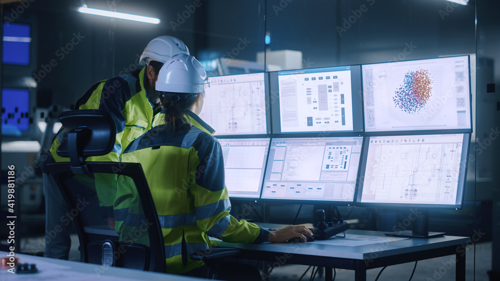 Poster Industry 4.0 Modern Factory: Project Engineer Talks to Female Operator who Controls Facility Production Line, Uses Computer with Screens Showing AI, Machine Learning Enhanced Assembly Process