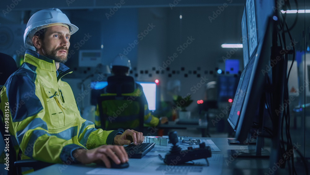 Poster Industry 4.0 Modern Factory: Facility Operator Controls Workshop Production Line, Uses Computer with Screens Showing Complex UI of Machine Operation Processes, Controllers. Side View Shot.
