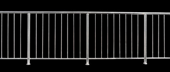 Chromium metal fence with handrail on a black