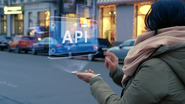 Woman interacts hologram API