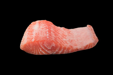 Piece of salmon fish sprinkled black salt