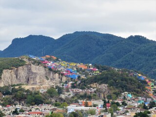 Fototapeta na wymiar Colorful houses on the mountain in San Cristobal de Las Casas, Mexico