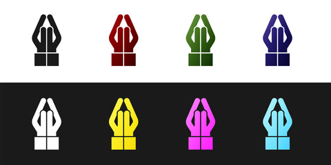 Set Hands in praying position icon isolated on black and white background. Prayer to god with faith and hope. Vector