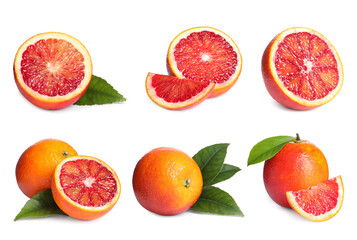 Set with ripe red oranges on white background