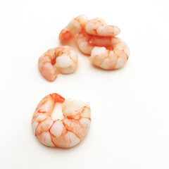 Cooked king prawns on white background