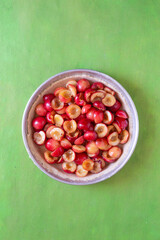 CHerry pie in the making: crust pie and filled whit red cherries