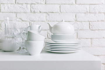 White dishes on the white background