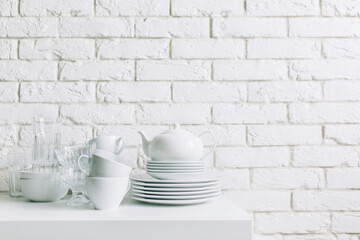 White dishes on the white background