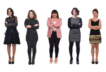 Obraz premium group of elegant women with arms crossed on white background