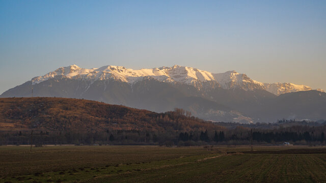Snowy peaks of Piatra Craiului mountain range near Brasov, Romania