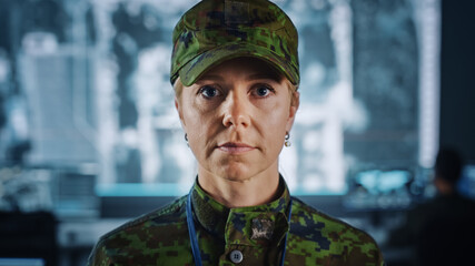 Portrait of a Female Military Officer Posing on Camera. She in Standing in Surveillance Cyber...