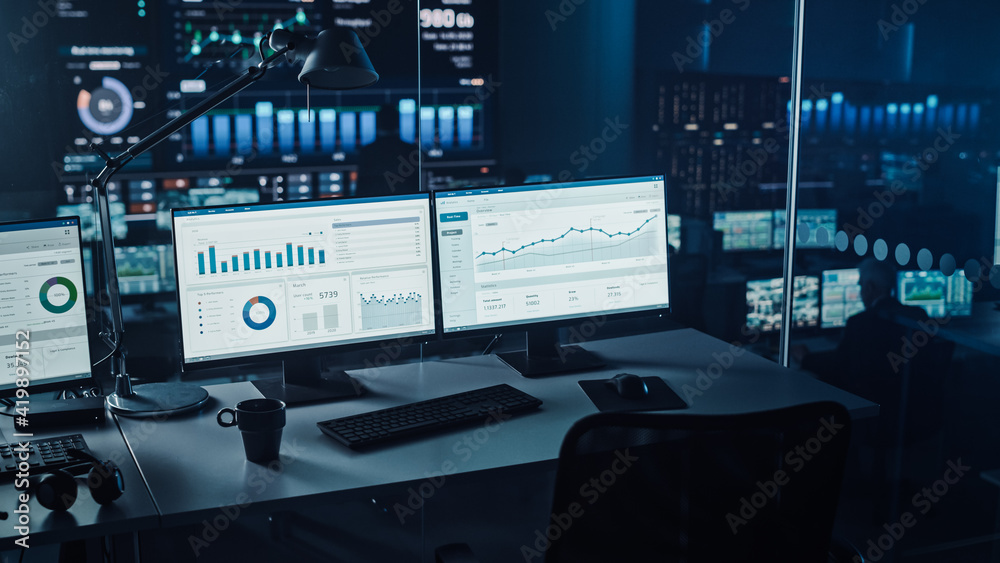 Poster Two Digital Computer Screens with Financial Analytical Data in Modern Monitoring Office. Control Room with Finance Specialists Sit in Front of Computers. 